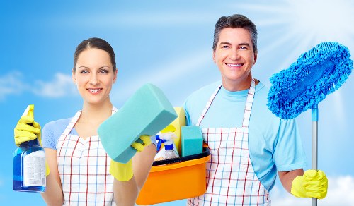 Safety-conscious carpet cleaning service in progress with equipment
